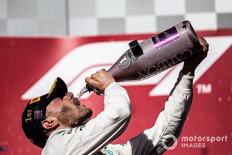 Valtteri Bottas, Mercedes AMG F1, 1st position, drinks Champagne on the podium