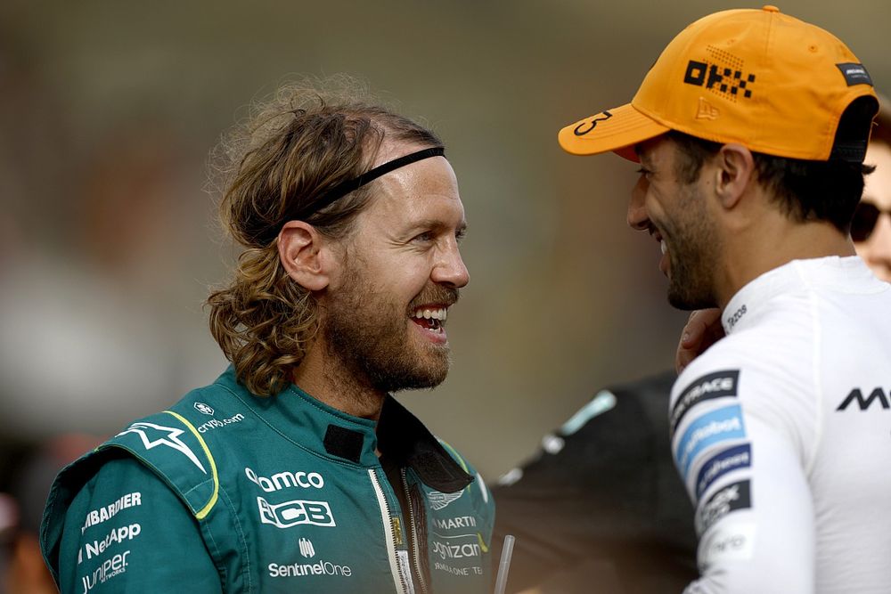 Sebastian Vettel, Aston Martin, with Daniel Ricciardo, McLaren
