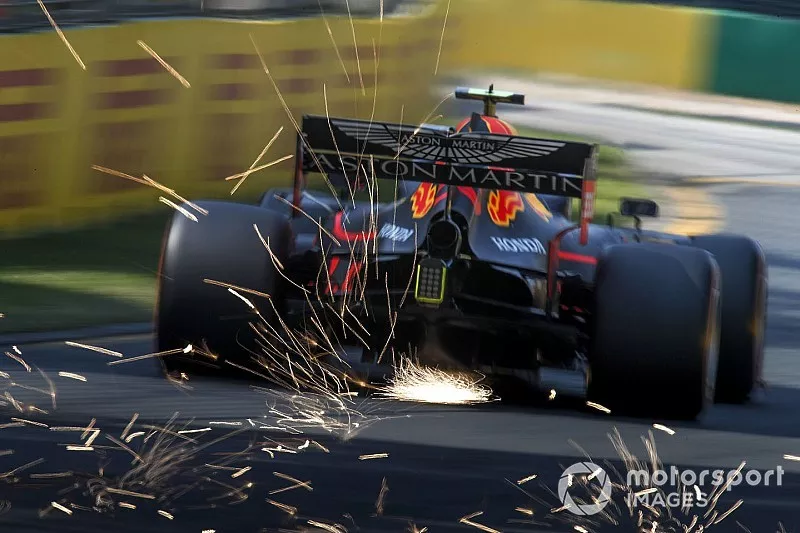 Pierre Gasly, Red Bull Racing RB15, kicks up some sparks