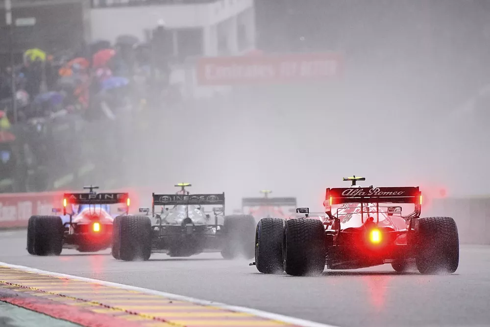 Fernando Alonso, Alpine A521, Valtteri Bottas, Mercedes W12, and Antonio Giovinazzi, Alfa Romeo Racing C41