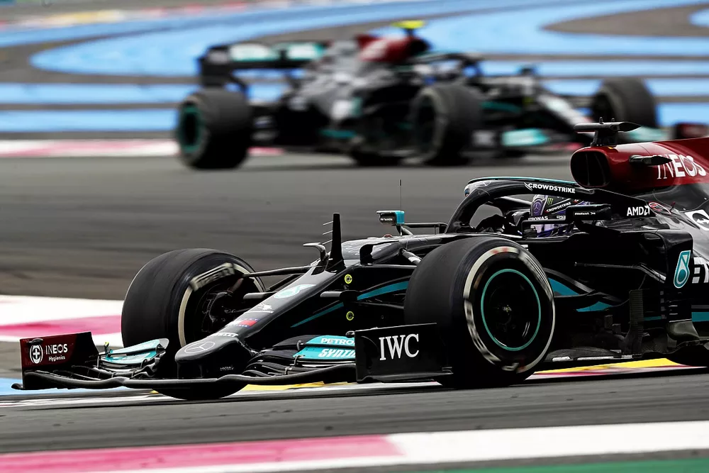 Sir Lewis Hamilton, Mercedes W12, leads Valtteri Bottas, Mercedes W12