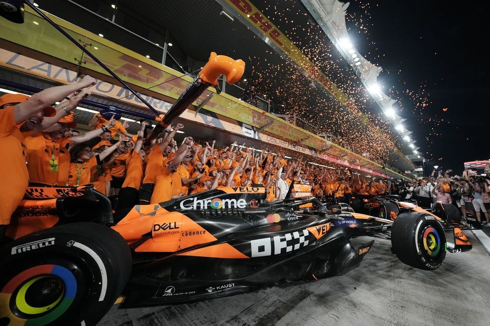 The McLaren team celebrate after securing the Constructors Championship title