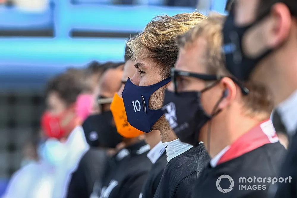 Pierre Gasly, AlphaTauri, stands with the other drivers on the grid prior to the start