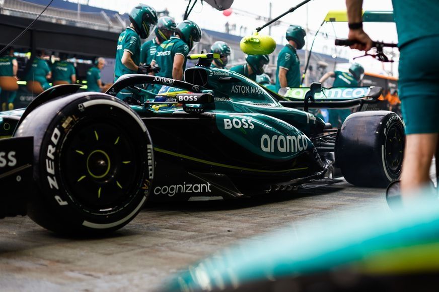 Fernando Alonso, Aston Martin AMR24, in the pit lane