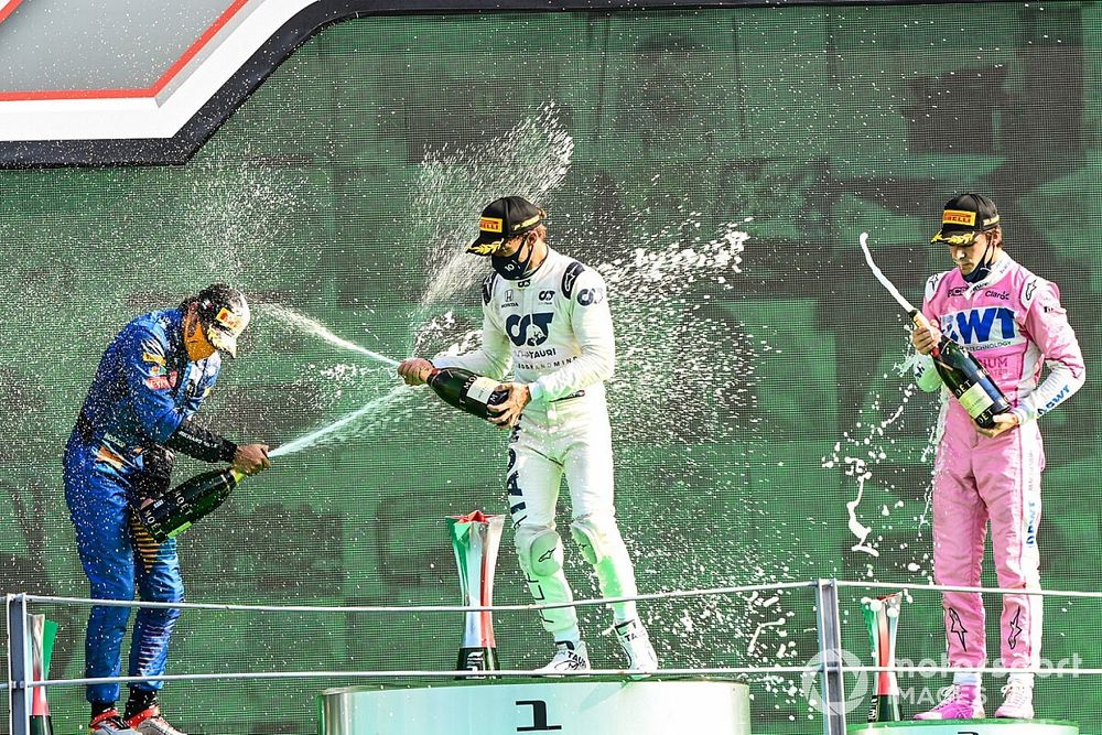 Carlos Sainz Jr., McLaren, 2nd position, Pierre Gasly, AlphaTauri, 1st position, and Lance Stroll, Racing Point, 3rd position, on the podium