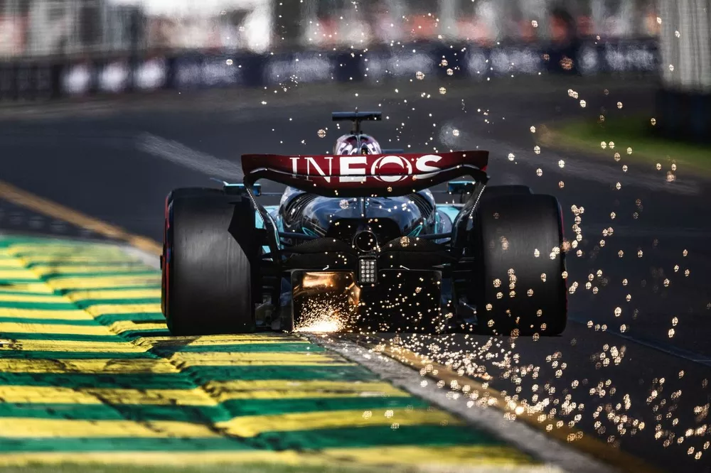 Sparks fly from George Russell, Mercedes F1 W15
