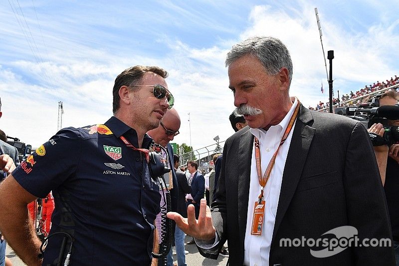 Christian Horner, director del equipo Red Bull Racing y Chase Carey, director ejecutivo Formula One Group