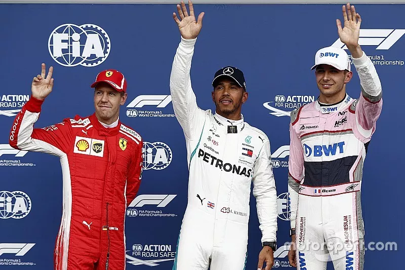 Le poleman Lewis Hamilton, Mercedes AMG F1, le deuxième, Sebastian Vettel, Ferrari, le troisième, Esteban Ocon, Racing Point Force India VJM11