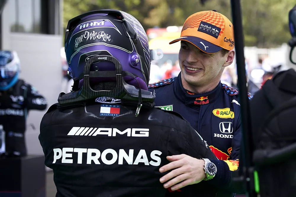 Lewis Hamilton, Mercedes, 1st position, and Max Verstappen, Red Bull Racing, 2nd position, congratulate each other in Parc Ferme