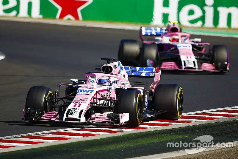 Sergio Perez, Force India VJM11, leads Esteban Ocon, Force India VJM11