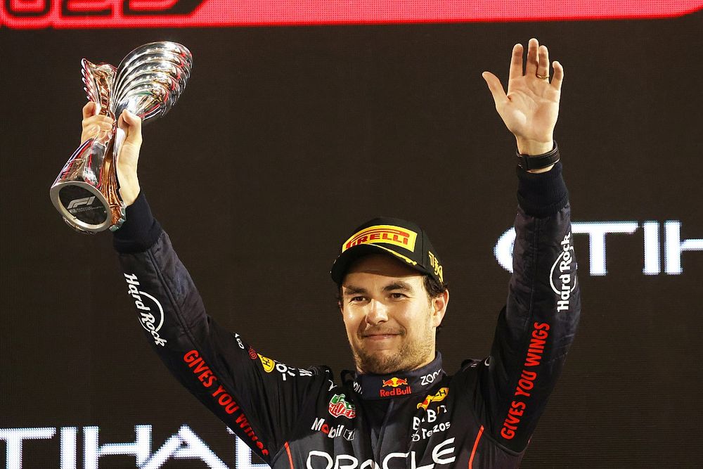Sergio Perez, Red Bull Racing, 3rd position, lifts his trophy