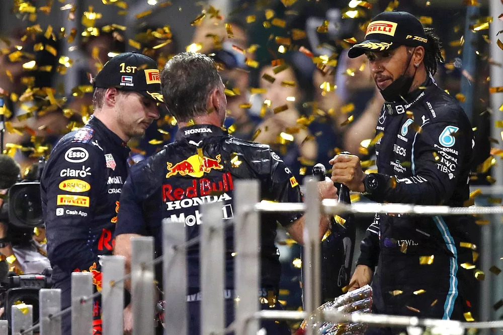 Max Verstappen, Red Bull Racing, 1st position, Christian Horner, Team Principal, Red Bull Racing, Lewis Hamilton, Mercedes, 2nd position, Carlos Sainz Jr., Ferrari, 3rd position, on the podium