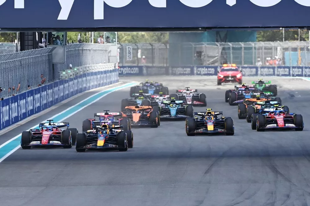 Max Verstappen, Red Bull Racing RB20, leads Charles Leclerc, Ferrari SF-24, Daniel Ricciardo, VCARB 01, Sergio Perez, Red Bull Racing RB20, Carlos Sainz, Ferrari SF-24, and the rest of the field at the start of the Sprint race
