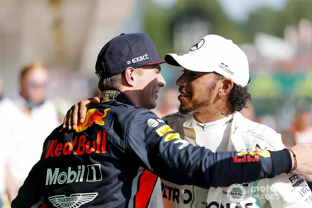 Max Verstappen, Red Bull Racing and Race winner Lewis Hamilton, Mercedes AMG F1 celebrate in Parc Ferme 