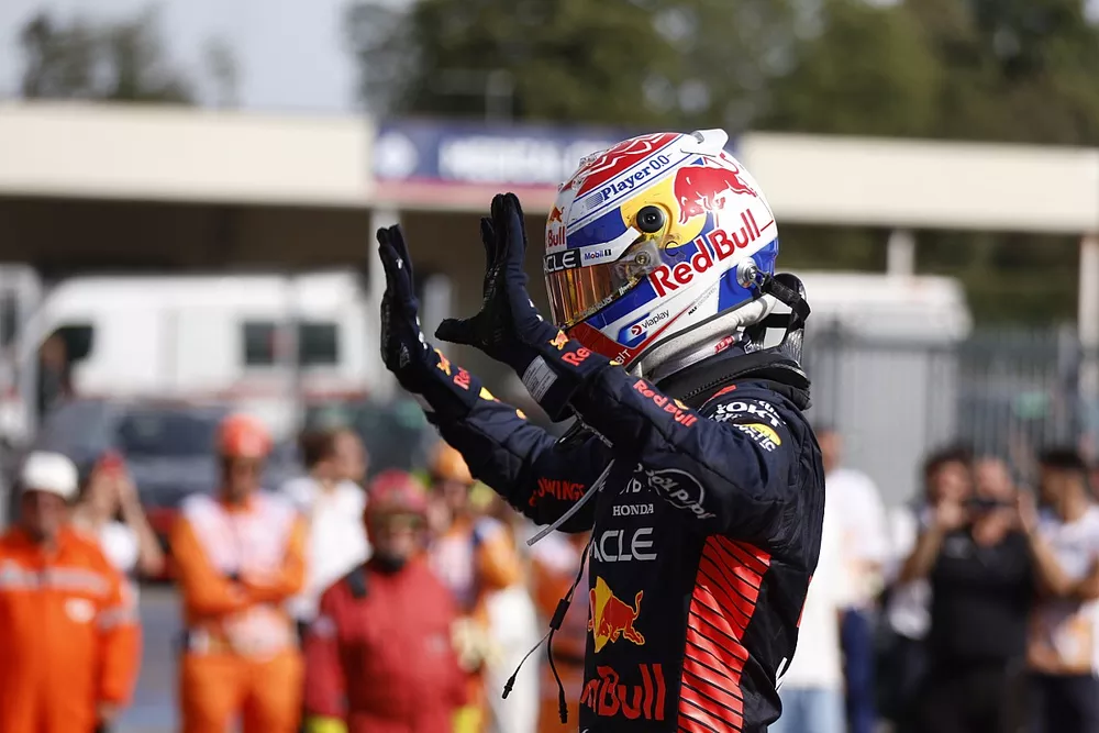 Max Verstappen, Red Bull Racing, 1st position, celebrates his record 10th consecutive win on arrival in Parc Ferme