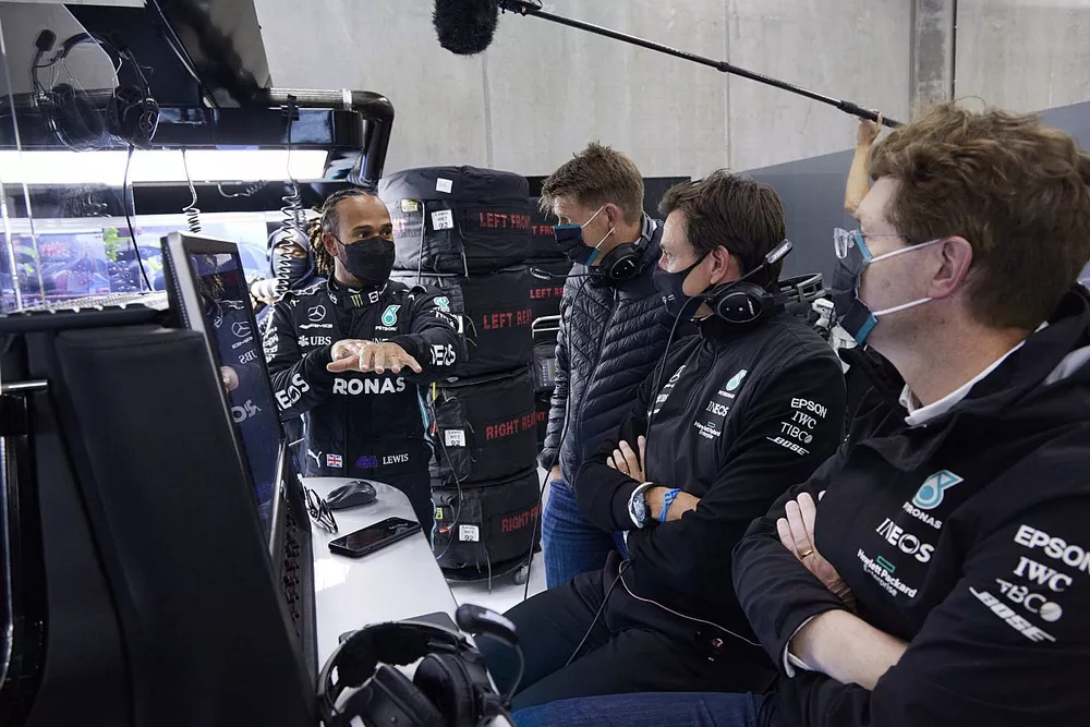 Lewis Hamilton, Mercedes, talks with Toto Wolff, Team Principal and CEO, Mercedes AMG, and other team mates