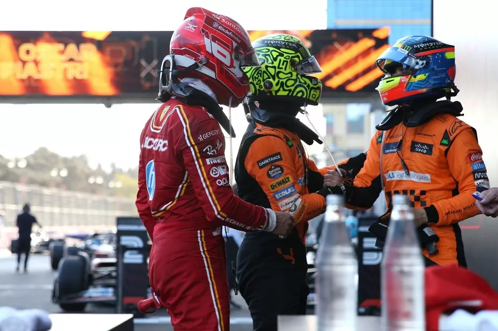 Charles Leclerc, Scuderia Ferrari, 2nd position, Lando Norris, McLaren F1 Team, congratulate Oscar Piastri, McLaren F1 Team, 1st position, in Parc Ferme