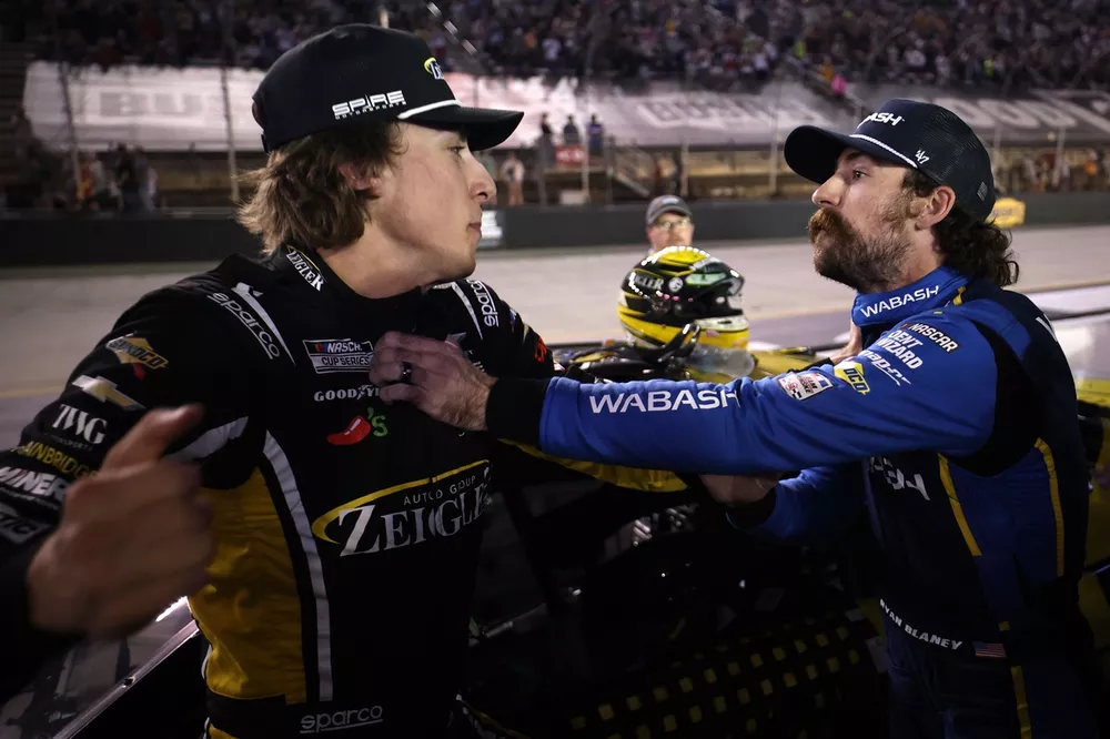 Carson Hocevar and Ryan Blaney fight