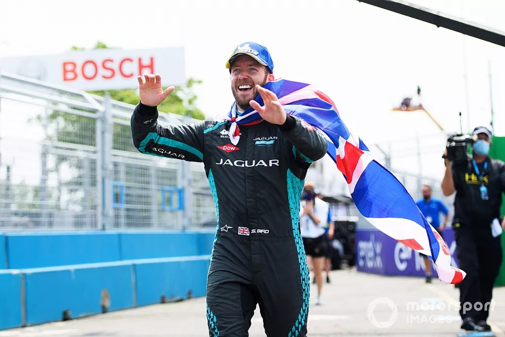 Sam Bird, Jaguar Racing, first position, with a Union flag cape