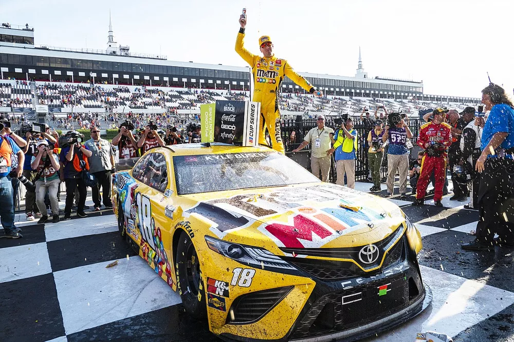 Race winner Kyle Busch, Joe Gibbs Racing, Toyota Camry M&M's Mini's