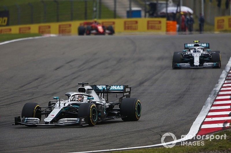 Lewis Hamilton, Mercedes AMG F1 W10, leads Valtteri Bottas, Mercedes AMG W10, and Charles Leclerc, Ferrari SF90