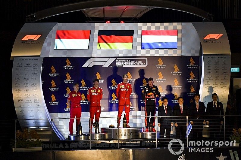 Charles Leclerc, Ferrari, Race winner Sebastian Vettel, Ferrari and Max Verstappen, Red Bull Racing on the podium