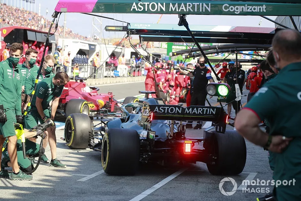 Lance Stroll, Aston Martin AMR21, in the pit lane