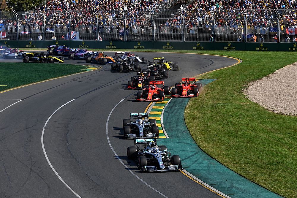 Valtteri Bottas, Mercedes AMG W10, leads Lewis Hamilton, Mercedes AMG F1 W10, Sebastian Vettel, Ferrari SF90, Charles Leclerc, Ferrari SF90, and Max Verstappen, Red Bull Racing RB15, and the rest of the field through the first corner