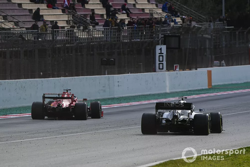 Charles Leclerc, Ferrari SF1000, passes Valtteri Bottas, Mercedes F1 W11