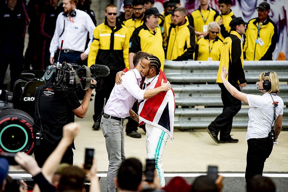 Lewis Hamilton, Mercedes AMG F1, 1st position, is congratulated by Jenson Button, Sky Sports F1