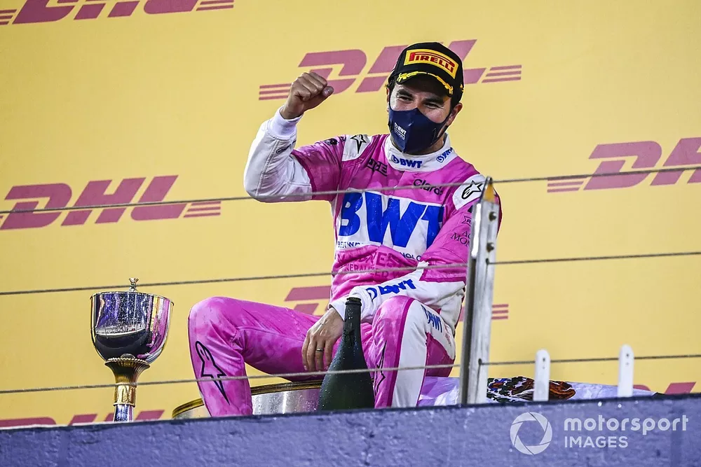 Sergio Perez, Racing Point, 1st position, celebrates on the podium