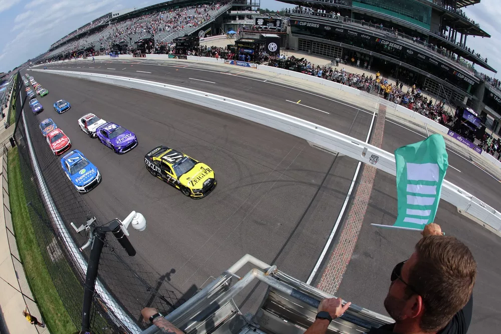 Carson Hocevar leads the field to the green flag of the Brickyard 400