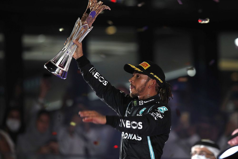 Lewis Hamilton, Mercedes, 1st position, lifts his trophy