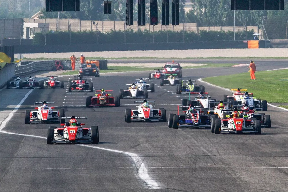Lance Stroll leads the start of first F4 race