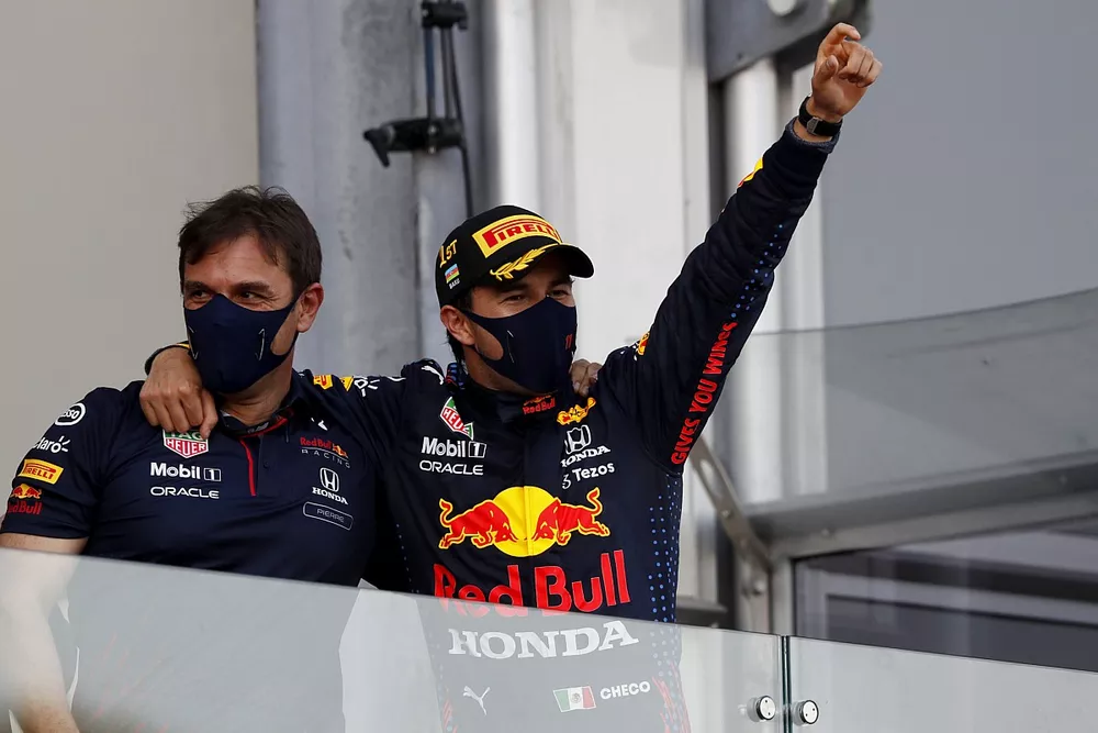 Sergio Perez, Red Bull Racing, 2nd position, arrives on the podium