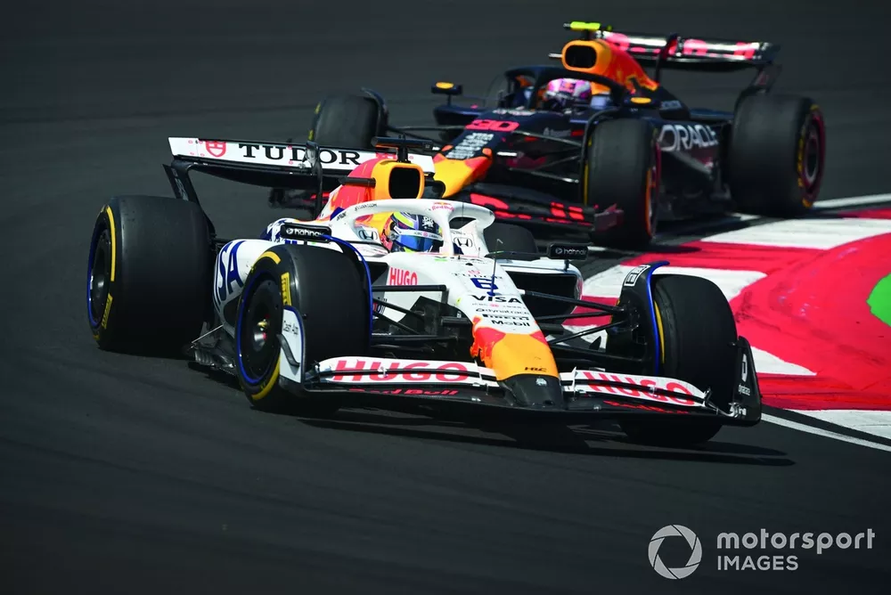 Isack Hadjar, Racing Bulls VCARB 02 leads Liam Lawson, Red Bull Racing RB21