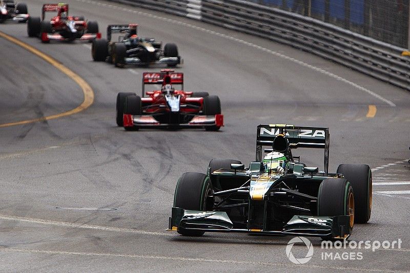 Heikki Kovalainen, Lotus T127 Cosworth, Timo Glock, Virgin VR-01 Cosworth, Jarno Trulli, Lotus T127 Cosworth, Lucas di Grassi, Virgin VR-01 Cosworth, and Karun Chandhok, HRT F1 F110-02