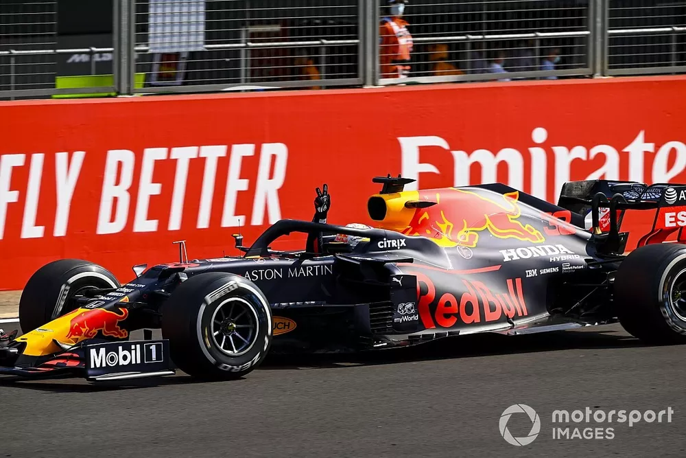 Race Winner Max Verstappen, Red Bull Racing RB16 crosses the finish line