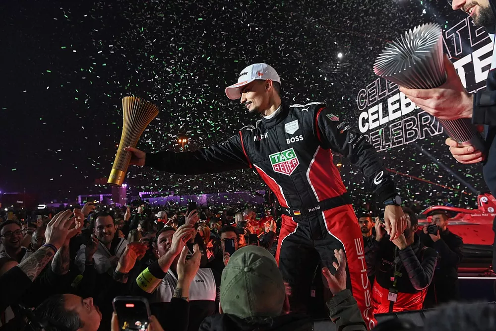 Pascal Wehrlein, Porsche, 1st position, with his trophy on the podium