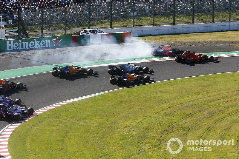 Max Verstappen, Red Bull Racing RB15 spins after making contact with Charles Leclerc, Ferrari SF90 