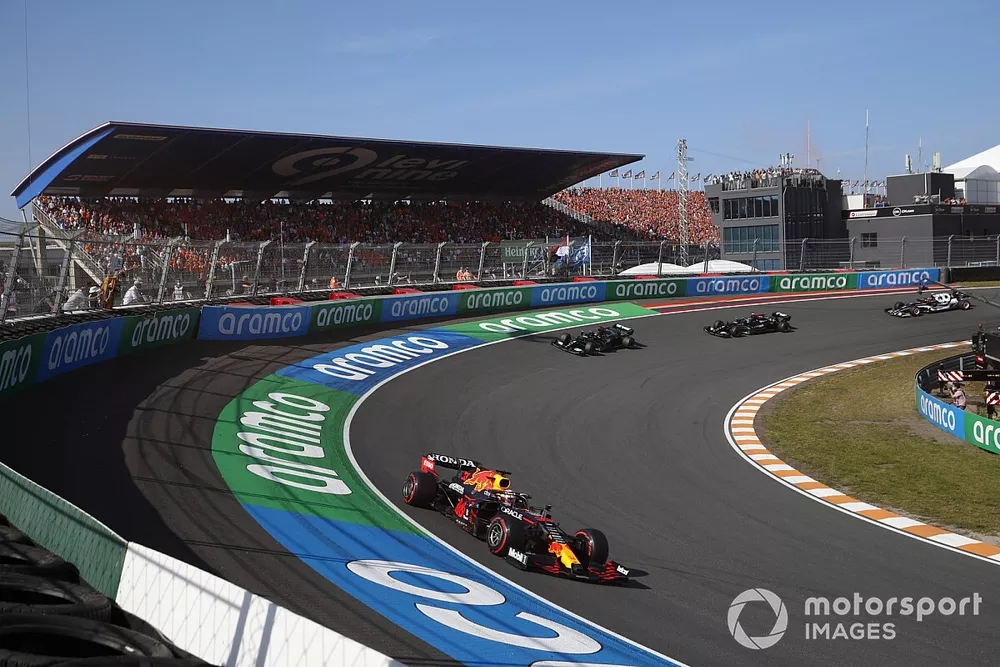 Max Verstappen, Red Bull Racing RB16B, Lewis Hamilton, Mercedes W12, and Valtteri Bottas, Mercedes W12