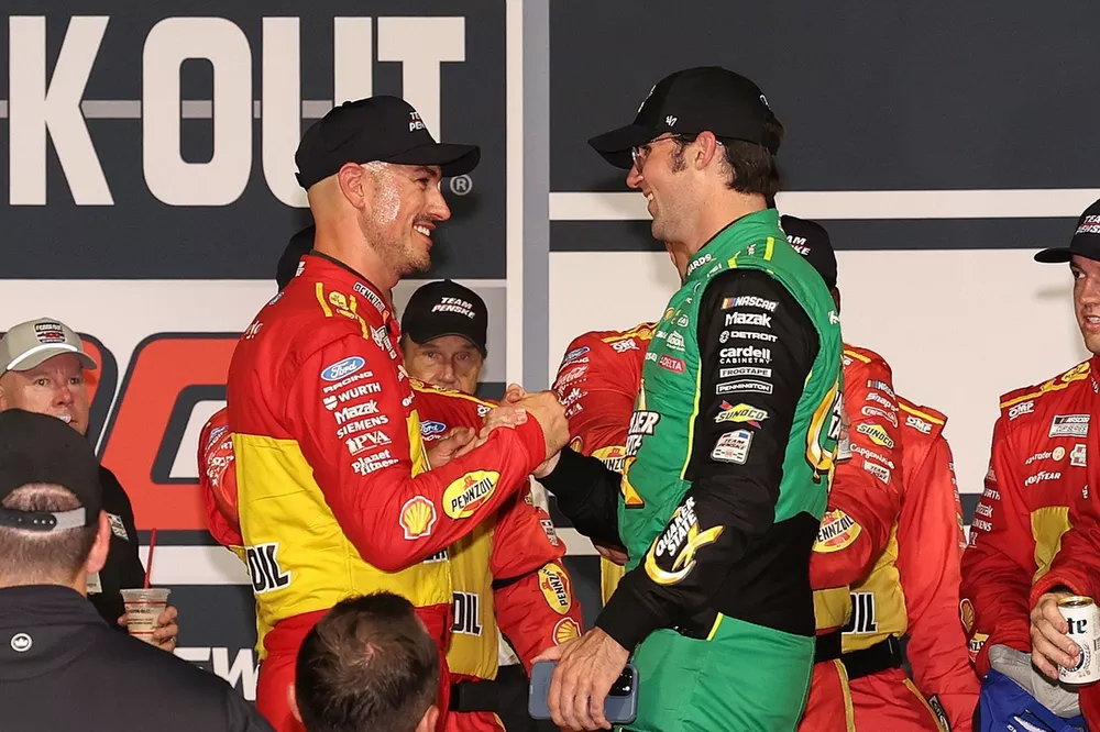 Joey Logano (rigjt) and teammate Austin Cindric (left) in Victory Lane, Team Penske