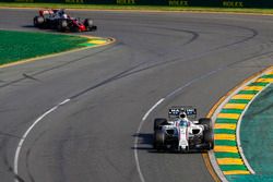 Felipe Massa, Williams FW40, leads Romain Grosjean, Haas F1 Team VF-17