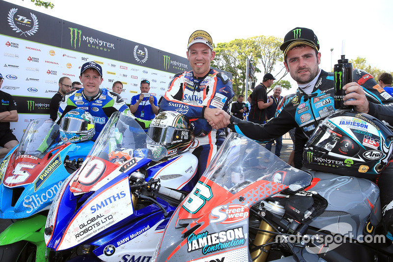 RL360º Superstock TT race winner Peter Hickman celebrates with runner up Michael Dunlop and third placed Dean Harrison 