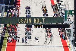 Usain Bolt performs his lightning bolt pose prior to the start