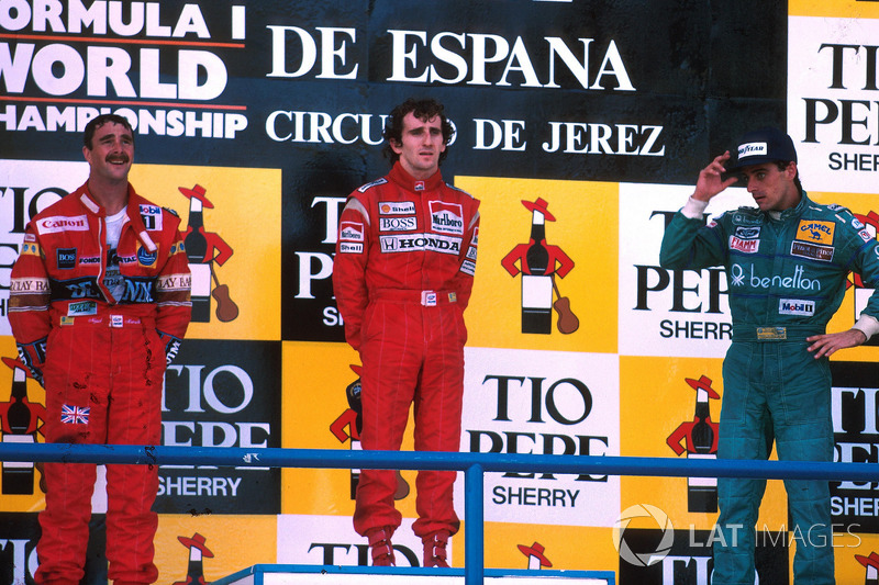 Podium: race winner Alain Prost, McLaren, second place Nigel Mansell, Williams, third place Alessand