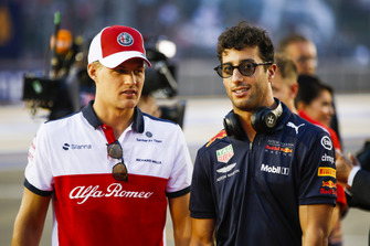 Marcus Ericsson, Sauber, and Daniel Ricciardo, Red Bull Racing, at the drivers parade