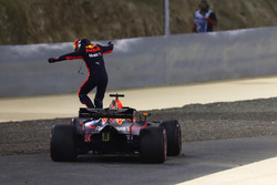 Daniel Ricciardo, Red Bull Racing RB14 Tag Heuer, jumps from his car after retiring from the race
