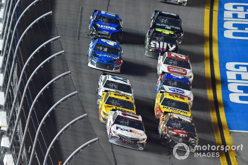 Denny Hamlin, Joe Gibbs Racing, Toyota Camry FedEx Express and Kyle Busch, Joe Gibbs Racing, Toyota Camry M&M's Chocolate Bar restart