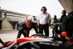 Zak Brown, Executive Director, McLaren Technology Group, looks on as Stoffel Vandoorne, McLaren MCL32